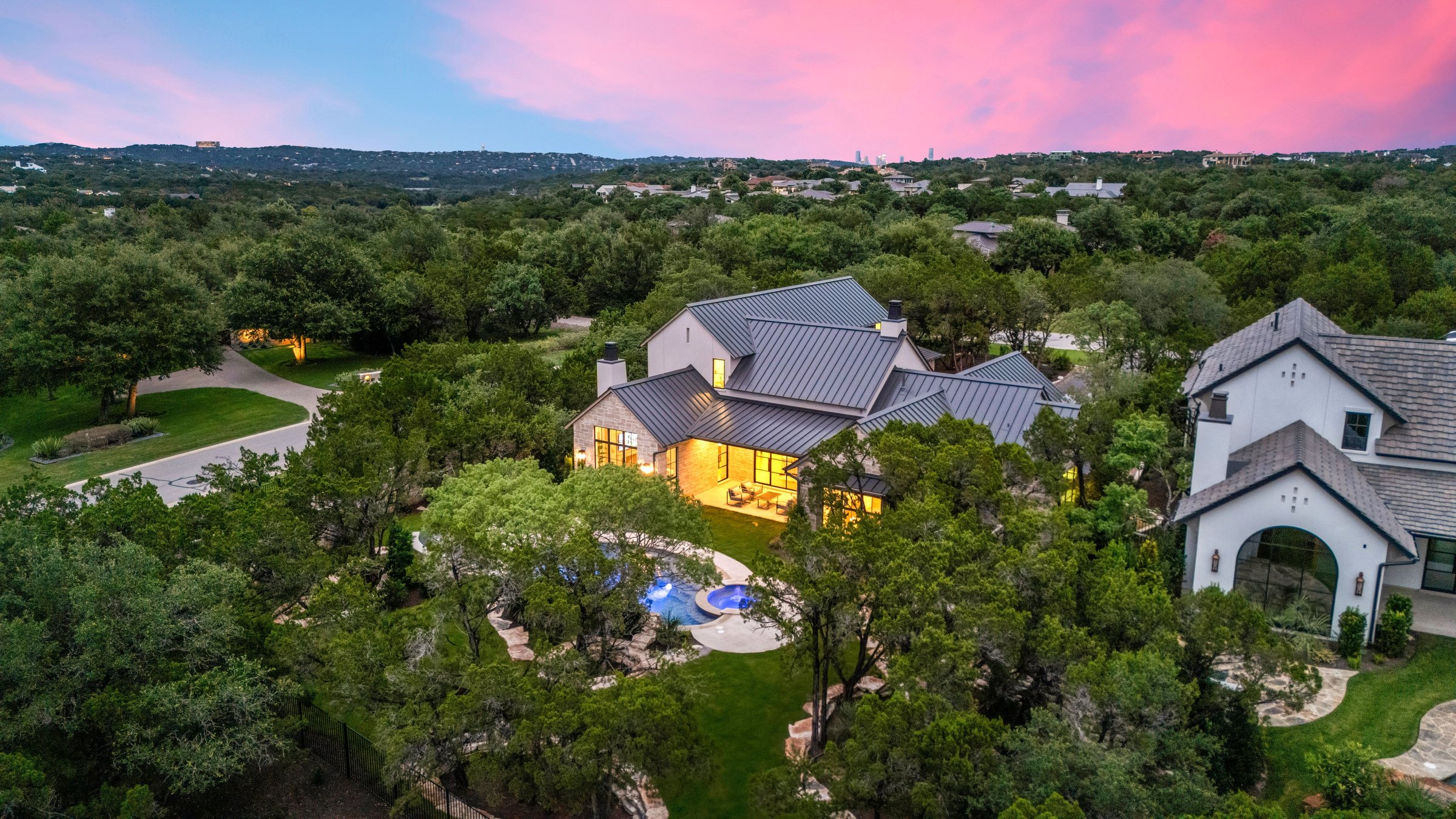 Twilight aerial view of 4300 Amarra Drive inside Amarra Cottages