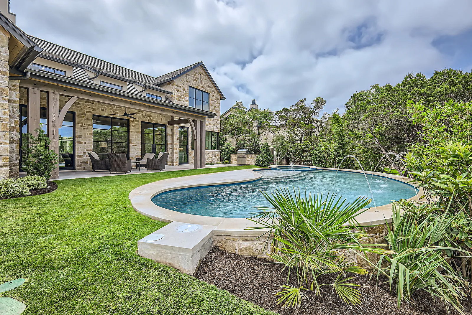 Pool and outdoor living area at an Amarra Cottages residence